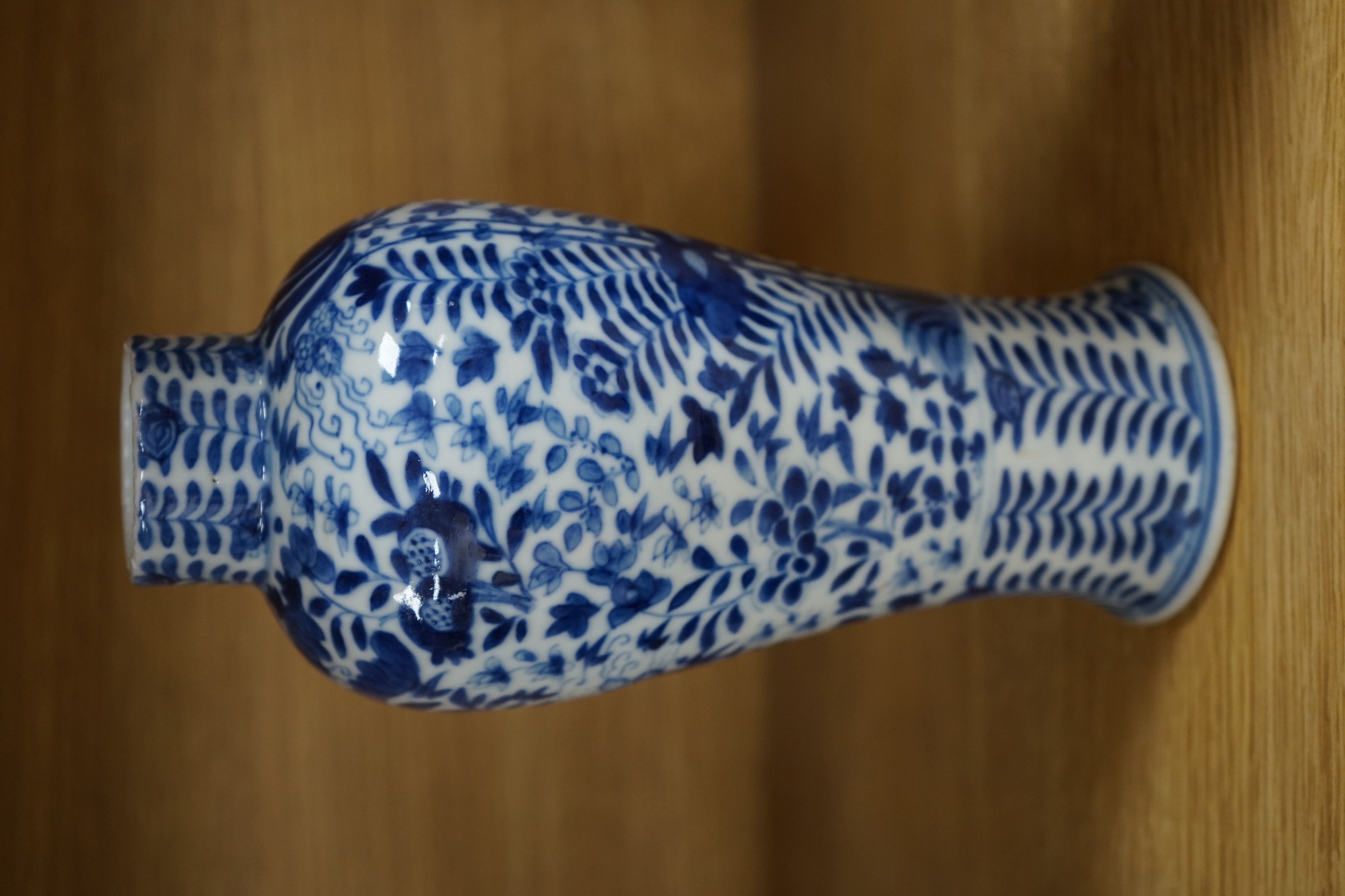 Two Chinese blue and white baluster vases, late 19th century and a Chinese sang de boeuf glazed vase, 27cm